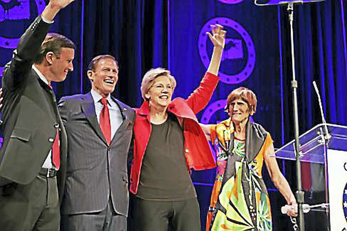 From left: U.S. Sens. Chris Murphy, Richard Blumenthal and Elizabeth Warren with U.S. Rep. Rosa DeLauro at last year’s dinner.