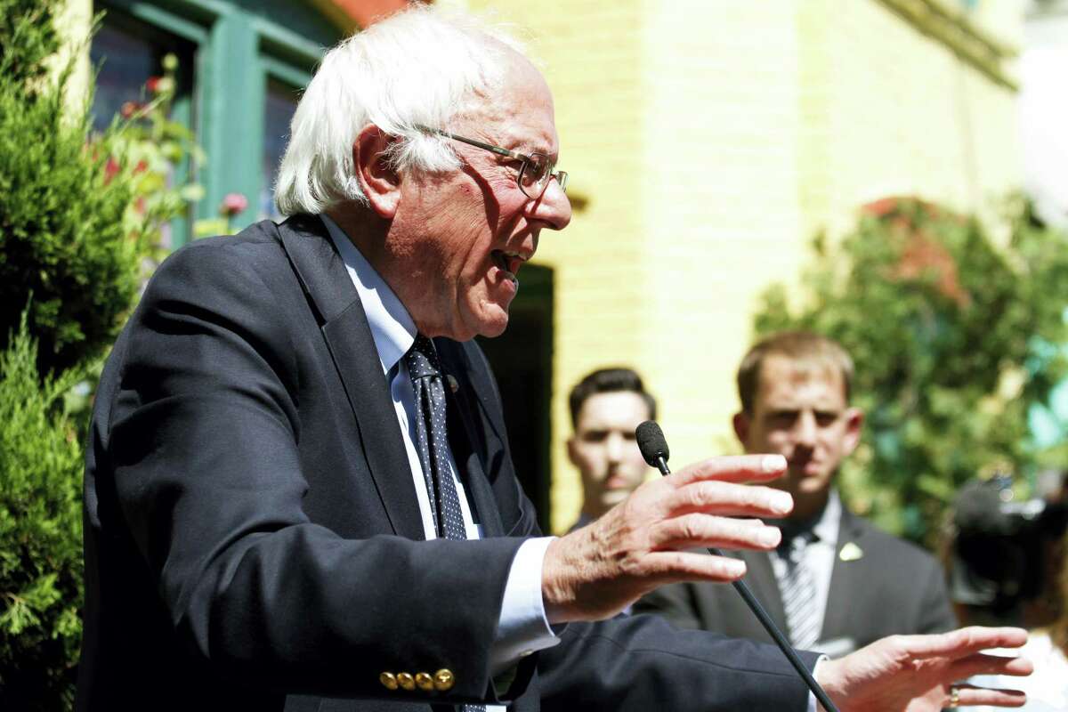 Democratic presidential candidate, Sen. Bernie Sanders, I-Vt., speaks during a news conference outside his campaign headquarters in Washington, Tuesday, June 14, 2016.