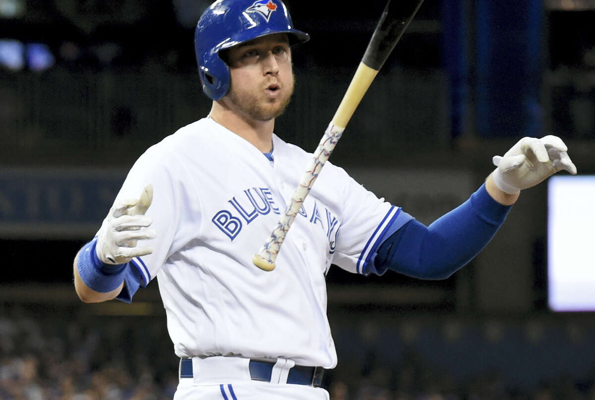 The Blue Jays’ Justin Smoak reacts after striking in the seventh inning.