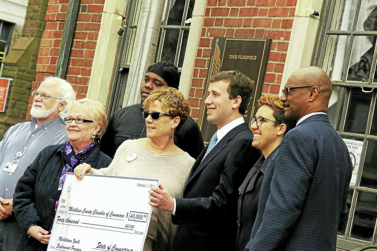 Chamber partners joined state Rep. Matthew Lesser Monday at the Middlesex Chamber of Commerce as he presented $40,000 to expand the Middletown Youth Employment Program. From left are: David Frankel from One MacDonough Place, Suzanne Kucharski of Remax Edge, Deivon Albrincoles, who completed the jobs program; Sue Dionne of the Northern Middlesex YMCA, Lesser, Elena Villafana of the North End Action Team, and Lorenzo Marshall of the Middlesex County Workforce Programs/Substance Abuse Council.