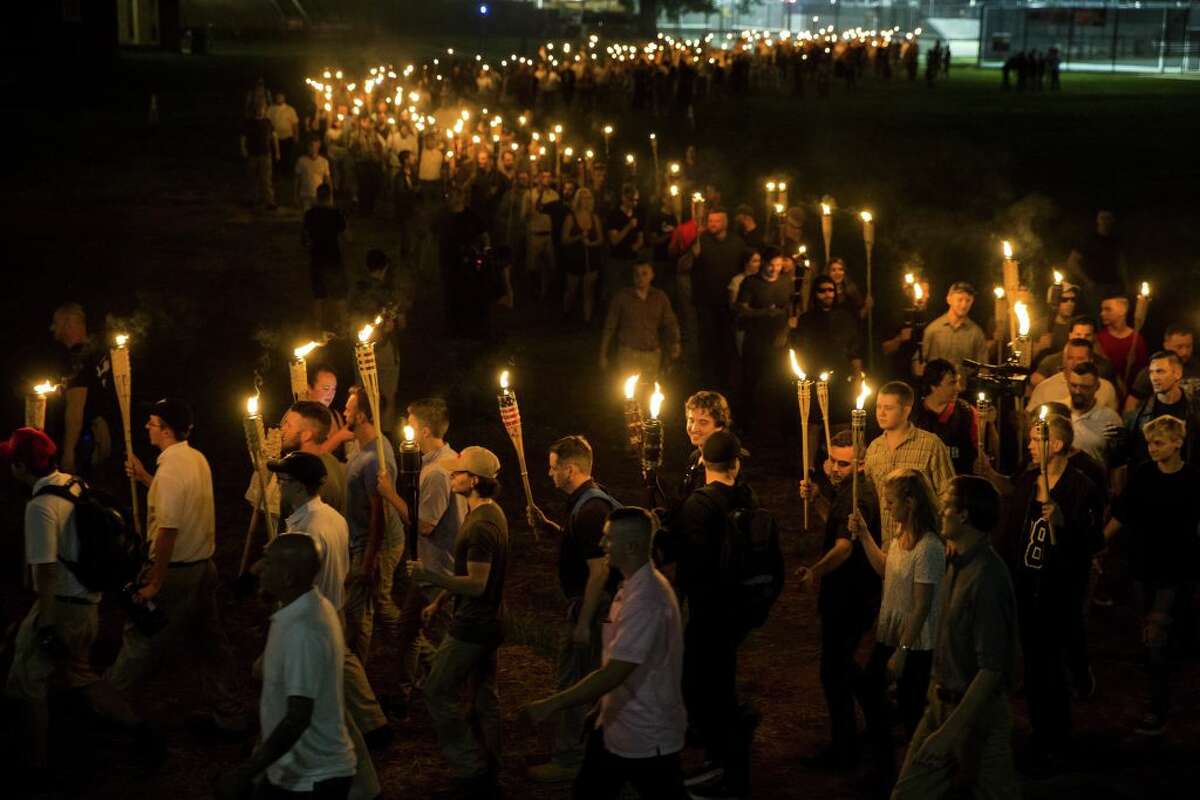 The full story behind the viral tiki torch sign photo