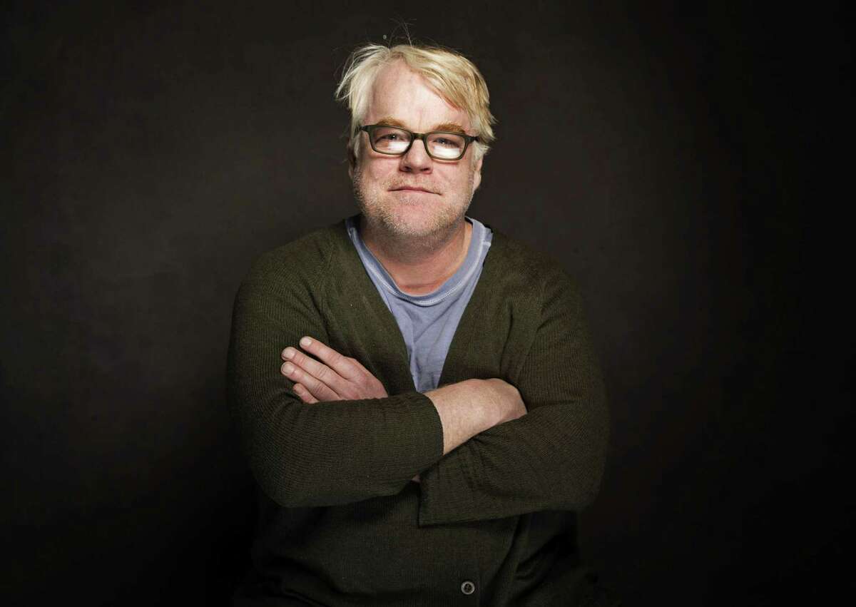 FILE - In this Jan. 19, 2014 photo, Philip Seymour Hoffman poses for a portrait at The Collective and Gibson Lounge Powered by CEG, during the Sundance Film Festival, in Park City, Utah. The new theater prize inspired by the late Hoffman is up and running and seeking submissions that ìexhibit fearlessness.î The Relentless Award, the largest annual cash prize in American theater awarded to a playwright in recognition of a new play, launched Friday, Jan. 30, 2015 with an annual award of $45,000 and the promise of workshops. Hoffman was found dead last Feb. 2, in New York. He was 46. (Photo by Victoria Will/Invision/AP, File)