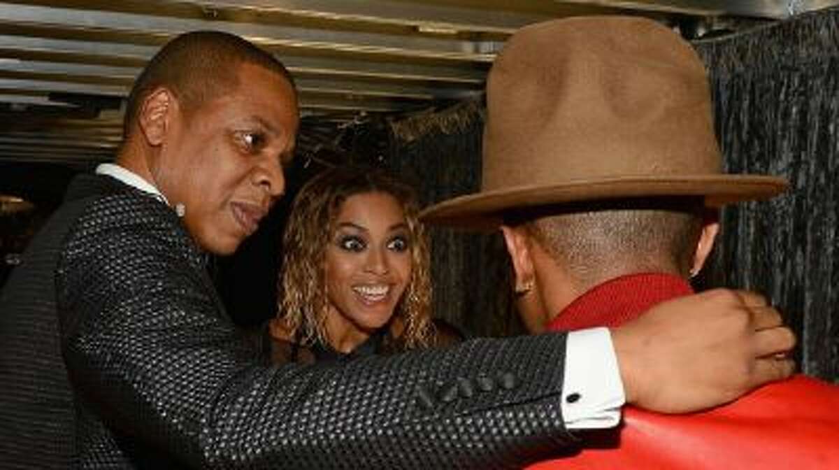 Musicians Jay-Z, Beyonce, and Pharrell Williams attend the 56th Grammy Awards at Staples Center on Jan. 26, 2014 in Los Angeles.