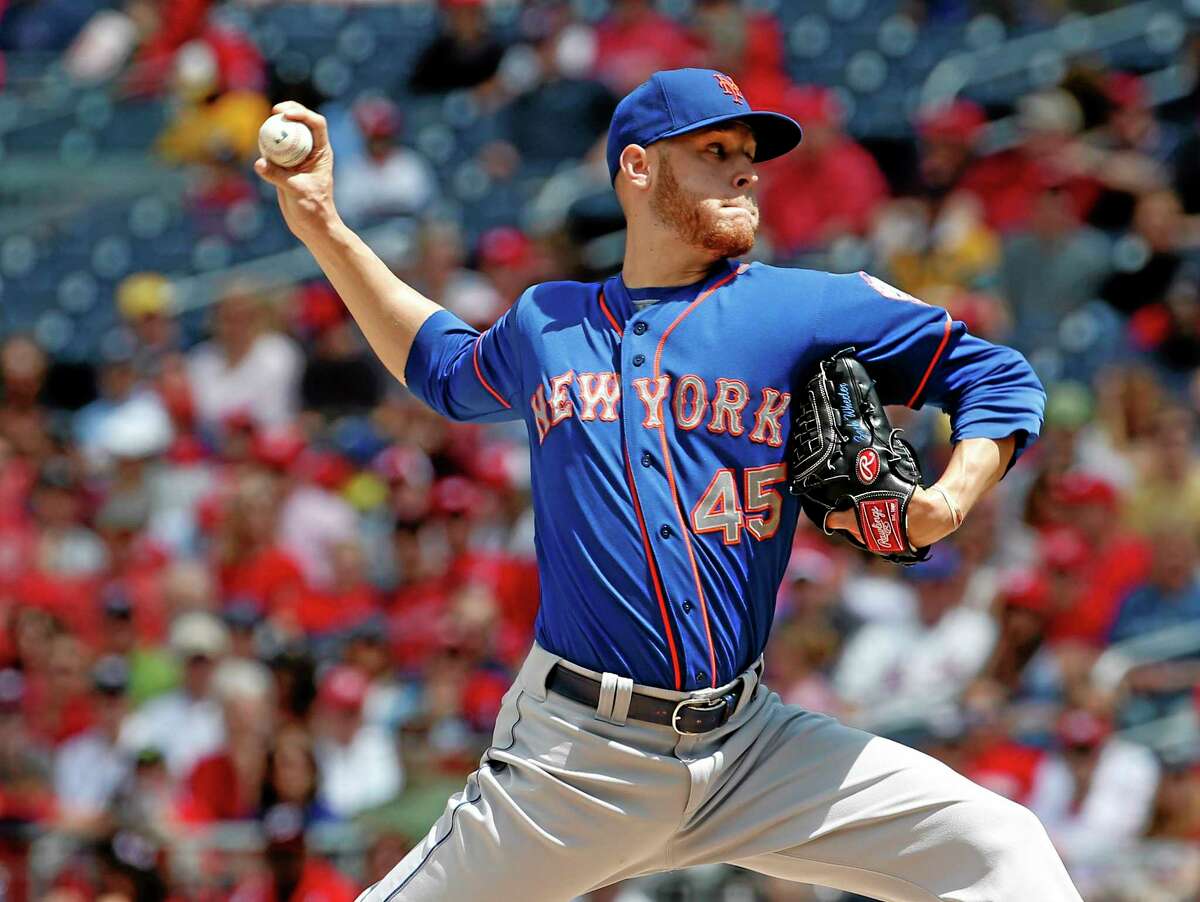 New York Mets starting pitcher Zack Wheeler throws during the third inning Sunday.