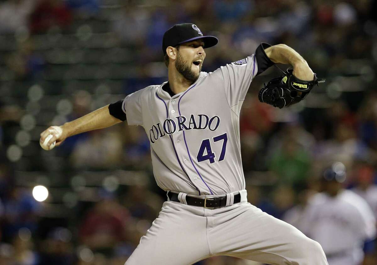 The New York Yankees acquired Colorado Rockies relief pitcher Chris Martin on Tuesday.