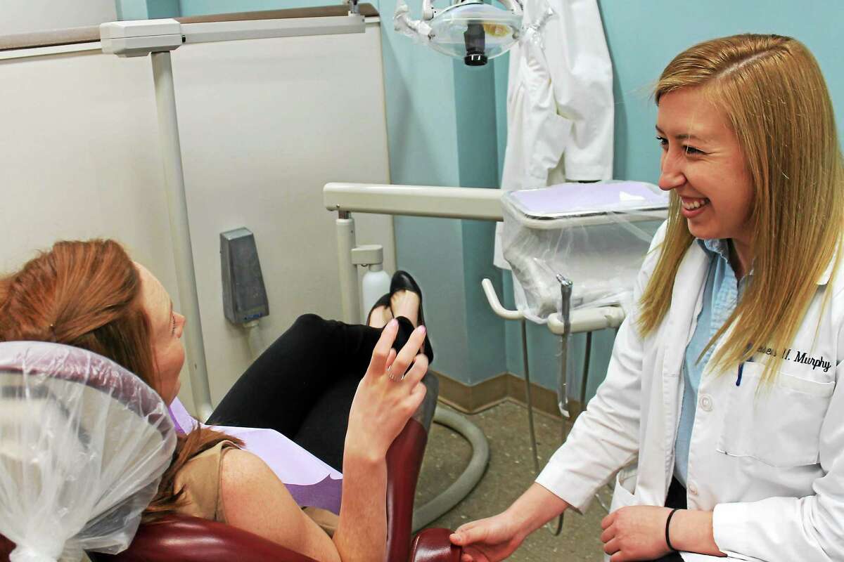 Kate Luskin for UConn Health Chelsea Murphy '14 DMD in a dental lab.