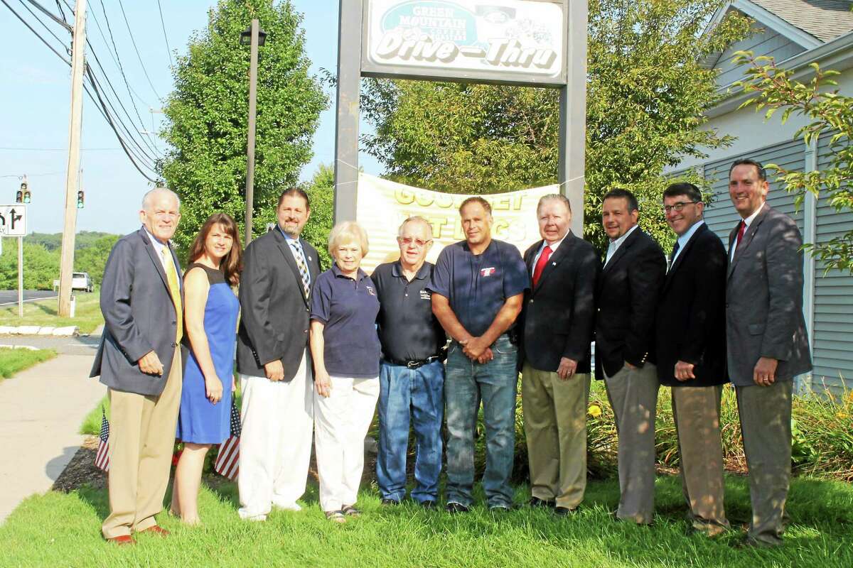 From left are Chamber President Larry McHugh, state. Rep. Christie Carpino, Cromwell Mayor Enzo Faienza, Sharon Bishop, Richard Bishop, Bill Bishop, Cromwell Division Chairman Jay Polke, Chairman Rich Carella, Cromwell Town Planner Stuart Popper and state Sen. Paul Doyle.