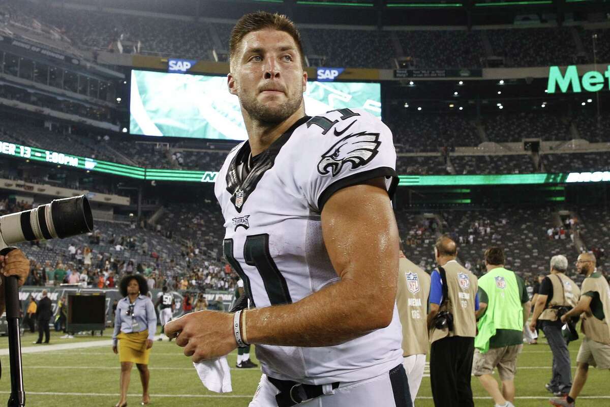 Philadelphia Eagles quarterback Tim Tebow (11) leaves the field after Thursday’s preseason game against the New York Jets in East Rutherford, N.J.
