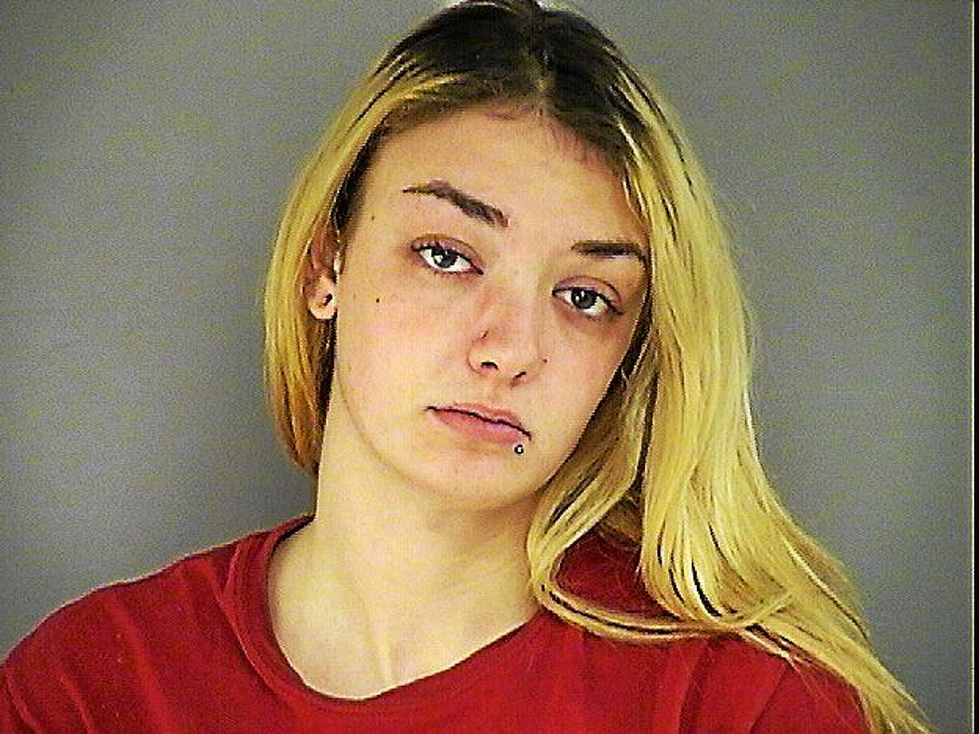 PD: Middletown woman smashes glass door during nude photo dispute