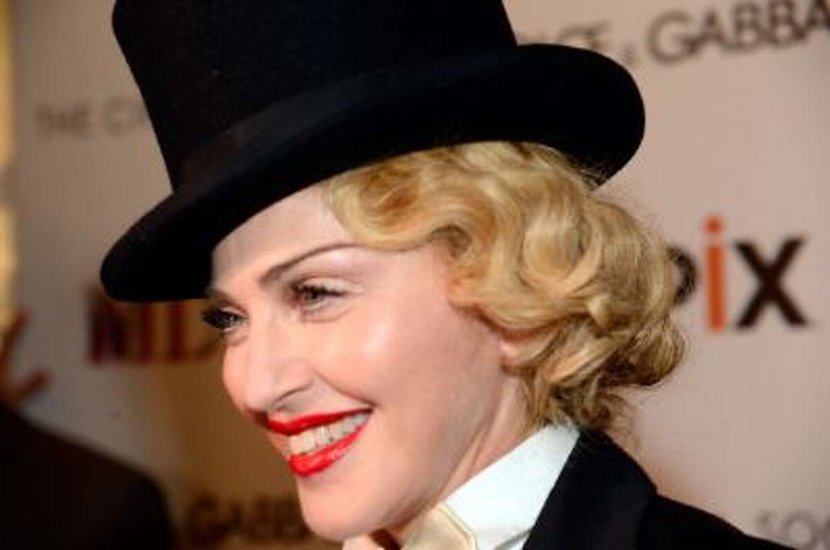 Madonna attends the Dolce & Gabbana and The Cinema Society screening of the Epix World premiere of 'Madonna: The MDNA Tour' at The Paris Theatre on June 18, 2013 in New York City.