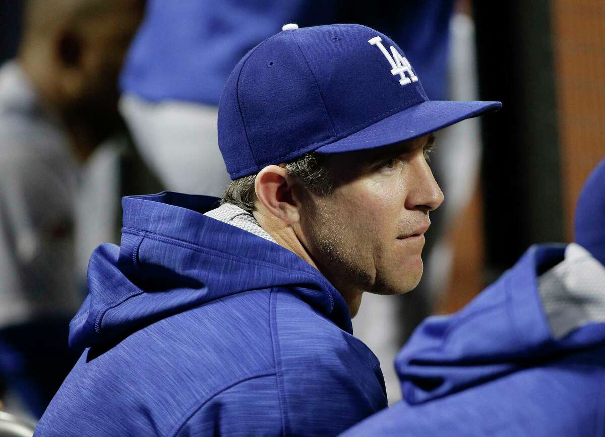The Los Angeles Dodgers’ Chase Utley watches from the dugout during the ninth inning of Game 3 of the National League division series against the Mets on Tuesday in New York.