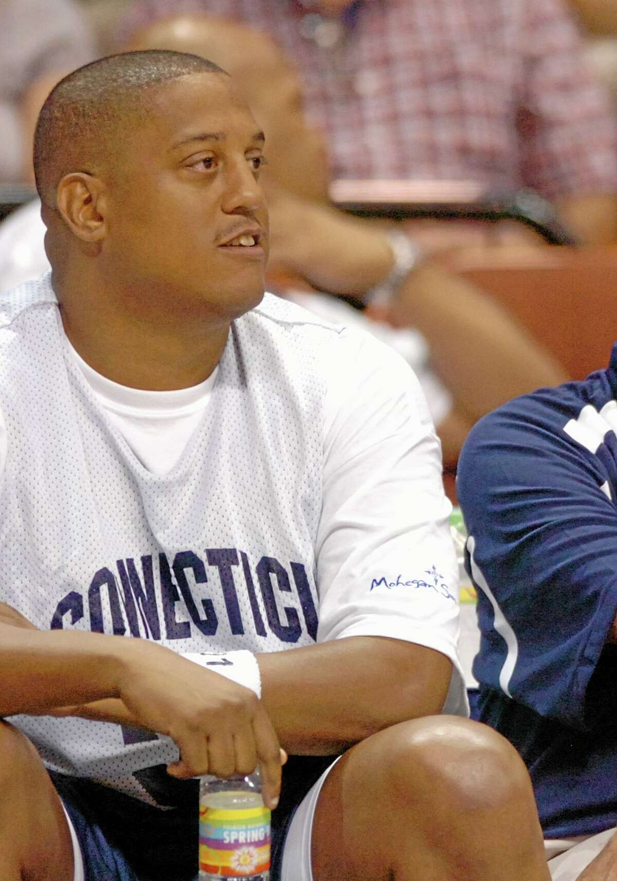 This Aug. 8, 2008 file photo shows former NBA and UConn player Tate George during the Jim Calhoun Celebrity Classic basketball game at the Mohegan Sun Arena in Uncasville.