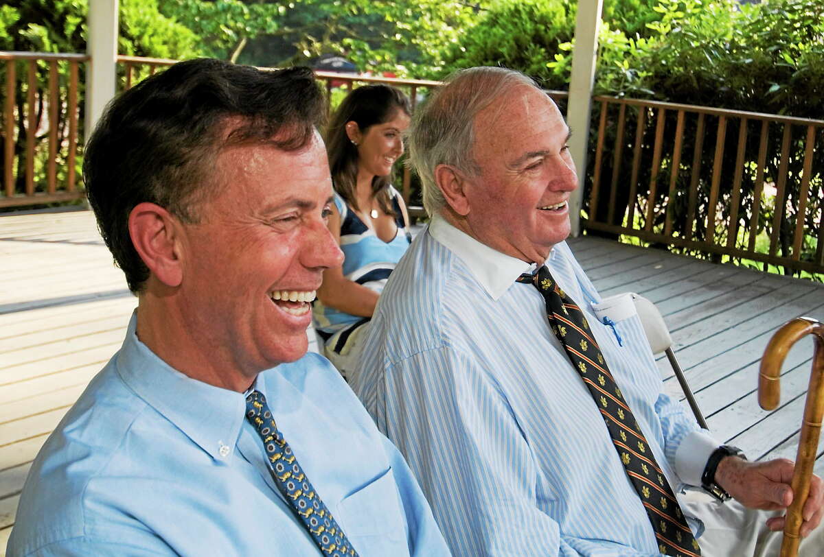 Former Connecticut Gov. Lowell Weicker, right, sits with former U.S. Senate candidate Ned Lamont during a fundraiser in this 2006 file photo.