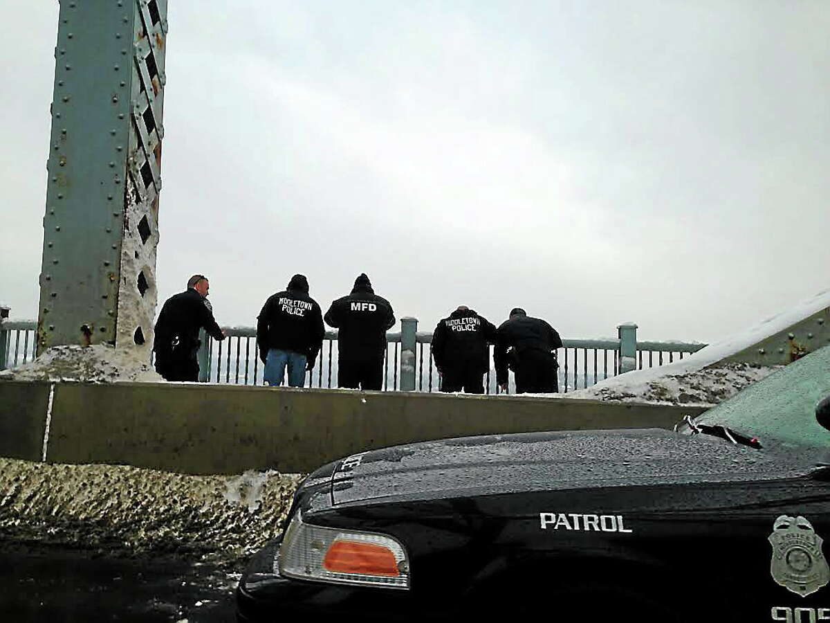 Emergency crews on the Arrigoni Bridge in Middletown on Wednesday, Feb. 19, 2014. A body was found in the Connecticut River.