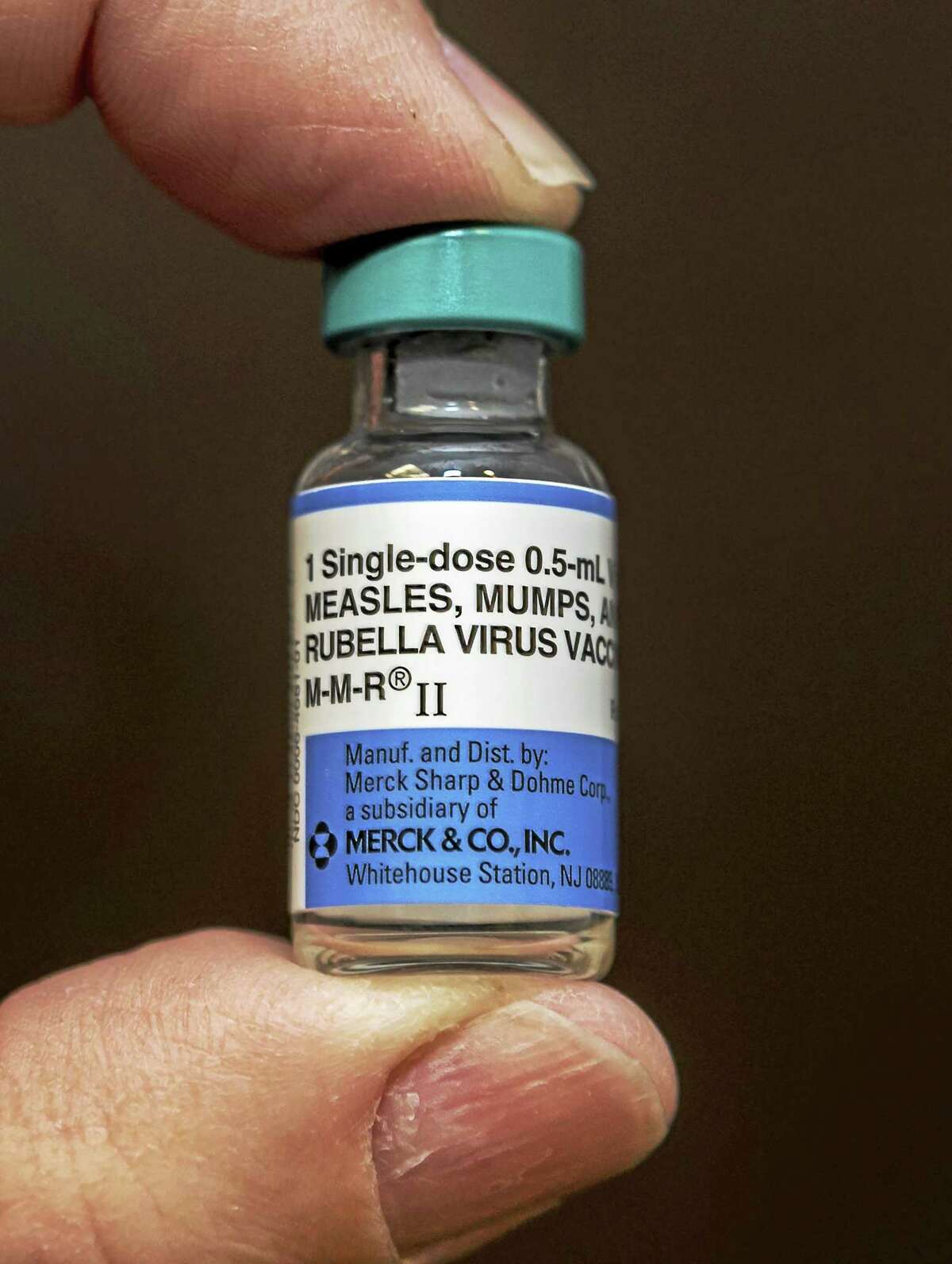 A single-dose vial of the measles-mumps-rubella virus vaccine live, or MMR vaccine is shown at the practice of Dr. Charles Goodman in Northridge, Calif.