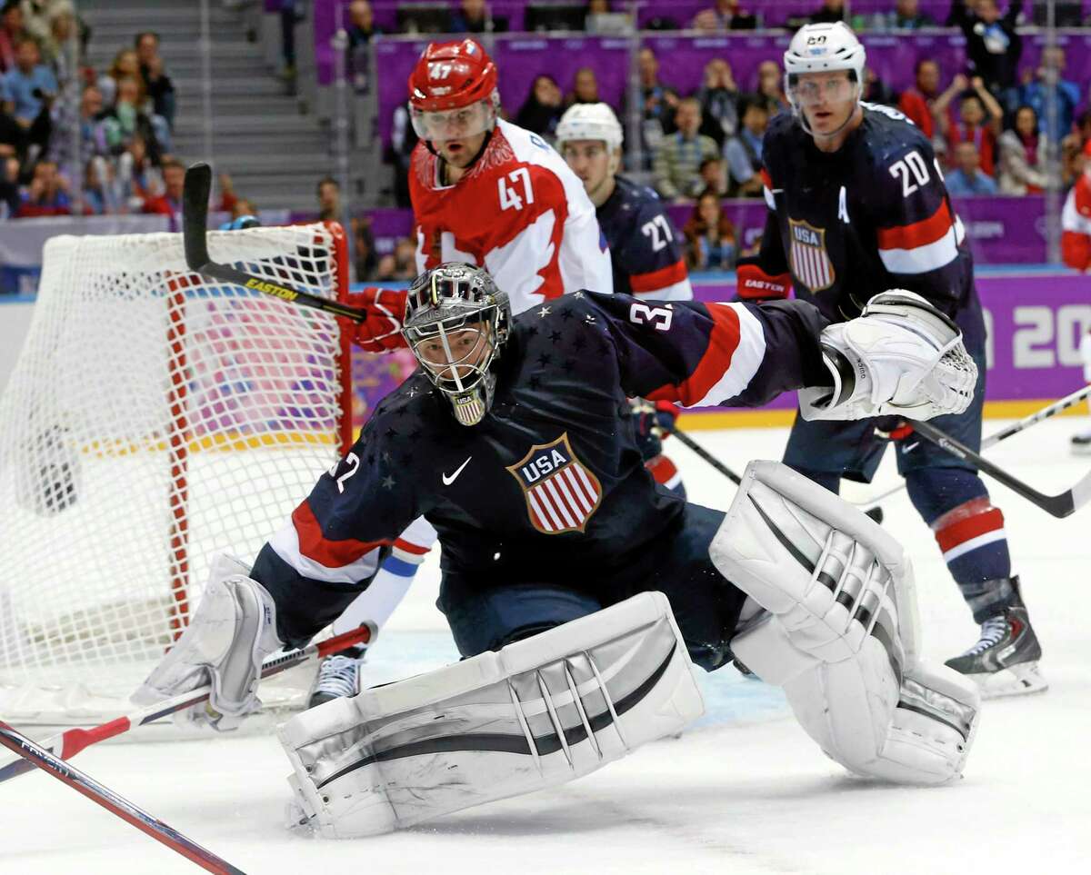 Team USA goaltender Jonathan Quick of Hamden comes out of the crease to defend the goal in the third period of Saturday’s win over Russia at the Winter Olympics in Sochi, Russia.