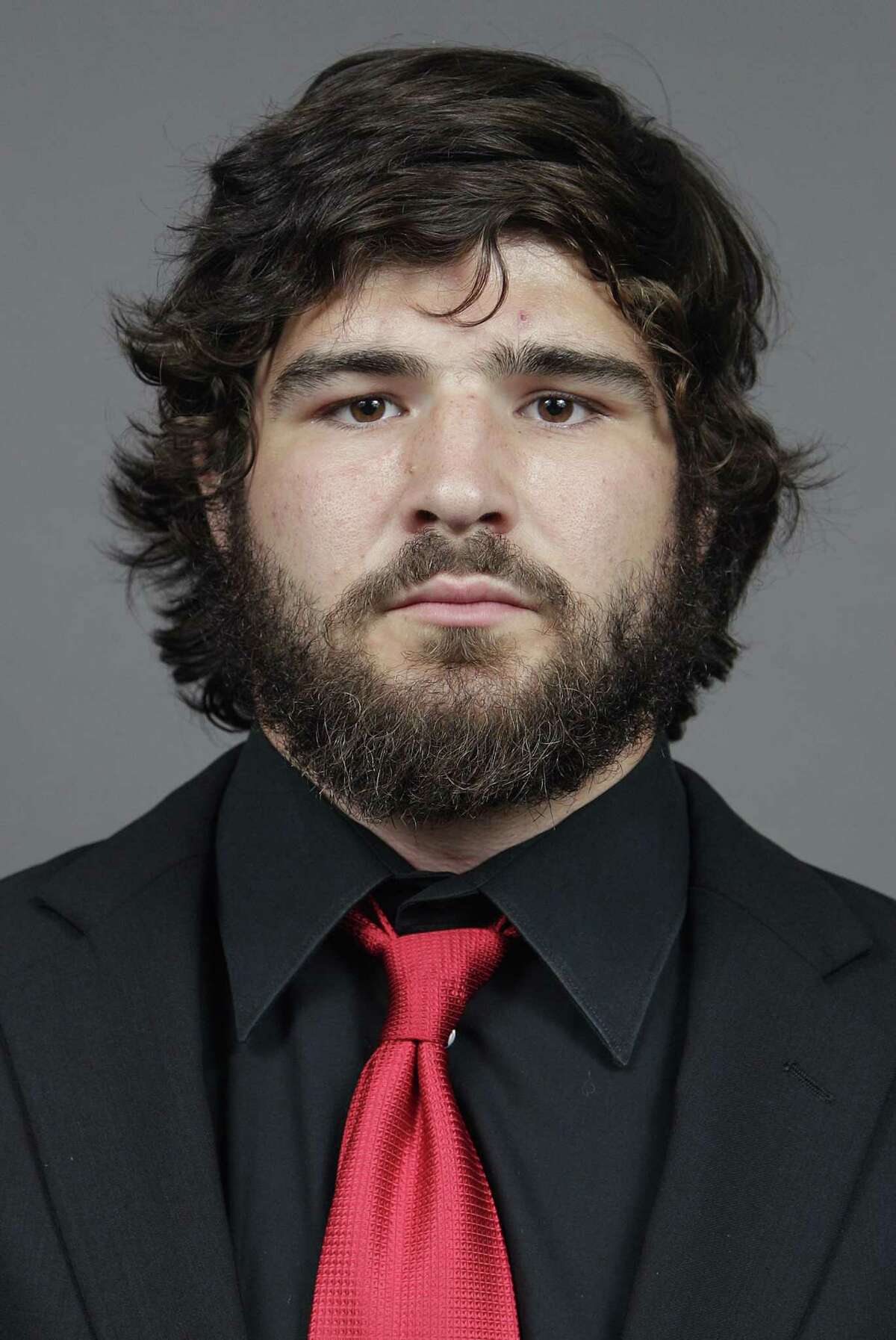 FILE - In this file image taken on Wednesday, Sept. 11, 2013, and provided by Ohio State University, college football player Kosta Karageorge poses for a photo in Columbus, Ohio. Police tell media outlets Sunday, Nov. 30, 2014, they believe a body found near the campus was that of 22-year-old Karageorge.