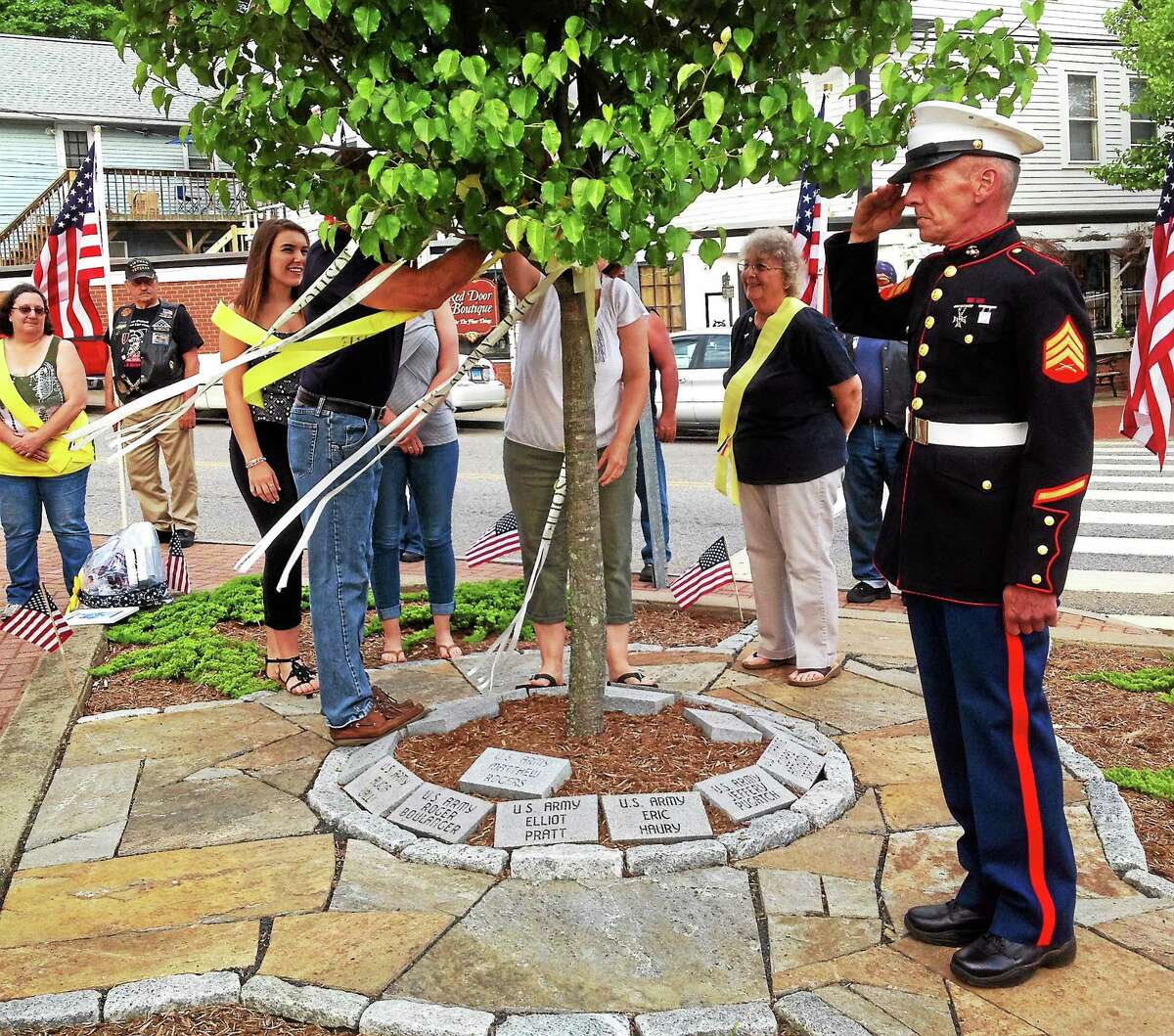 Jeff Mill - The Middletown Press From left are Megan, Caitlin, Susan and Jeff Beebe of East Hampton, the family of marine Jacob Beebe who was deployed to Afghanistan.