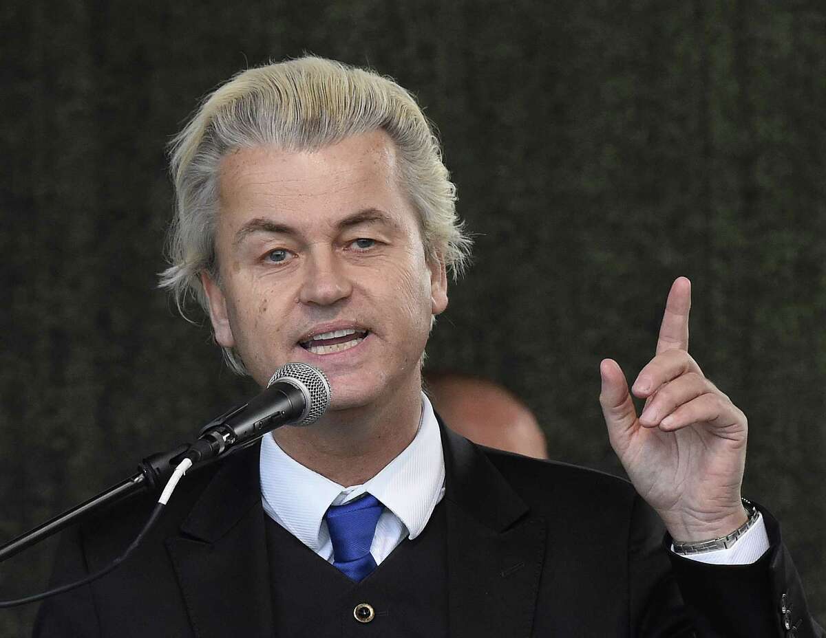 FILE - In this April 13, 2015 file photo Dutch anti-Islam lawmaker Geert Wilders as he speaks at a rally of so-called 'Patriotic Europeans against the Islamization of the West' (PEGIDA) in Dresden, Germany. Geert Wilders says on Wednesday, June 3, 2015 he plans to show cartoons of the Prophet Muhammad on Dutch television airtime reserved for political parties after Parliament refused to display them, in a move likely to deeply offend Muslims. (AP Photo/Jens Meyer, File)