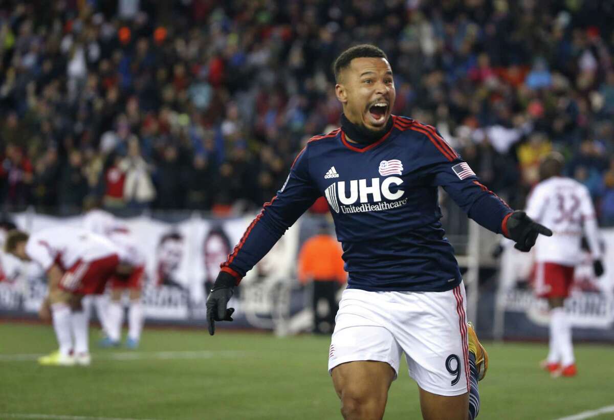 New England Revolution’s Charlie Davies celebrates his goal against the New York Red Bulls during the second half of the MLS Eastern Conference final on Saturday in Foxborough, Mass. The match ended 2-2 and New England advances to the MLS Cup with a two-game aggregate 4-3.