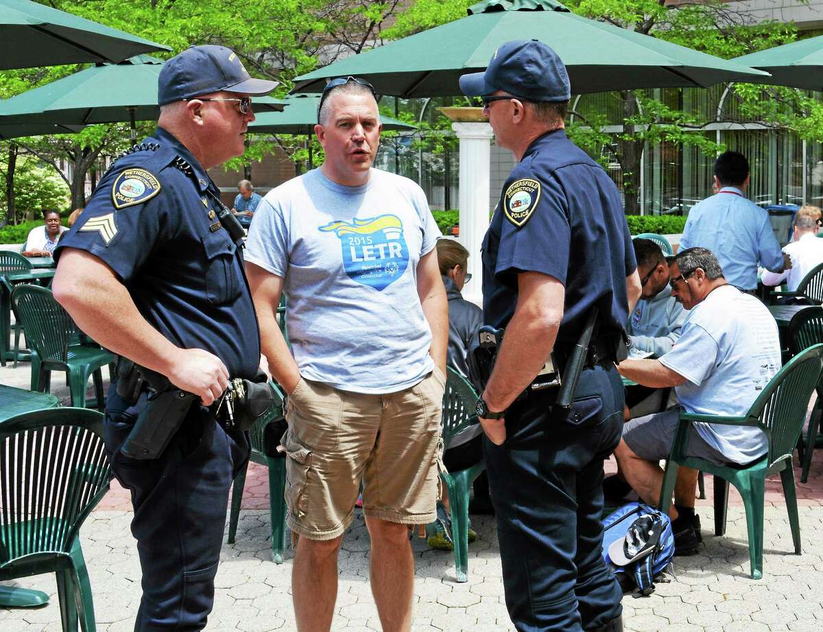 Law enforcement officers enjoyed a lunch of hot dogs, burgers and other picnic fare midway through the Special Olympics Connecticut Torch Run at Middlesex Mutual in Middletown June 4.