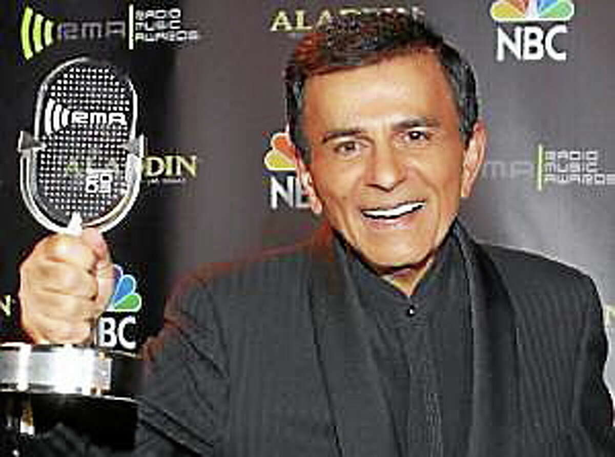 In this Oct. 27, 2003, file photo, Casey Kasem poses for photographers after receiving the Radio Icon award during The 2003 Radio Music Awards in Las Vegas.