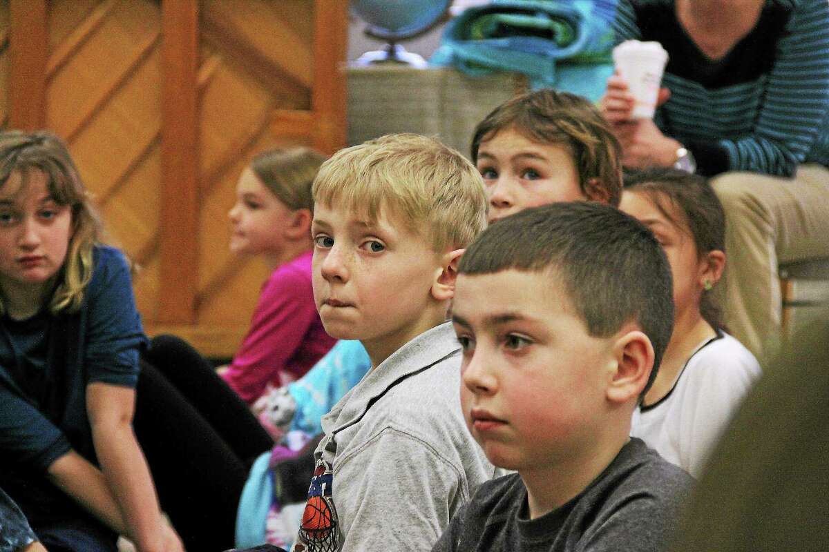 Brewster Elementary second-graders take part in a writing workshop on Tuesday with a children’s author.