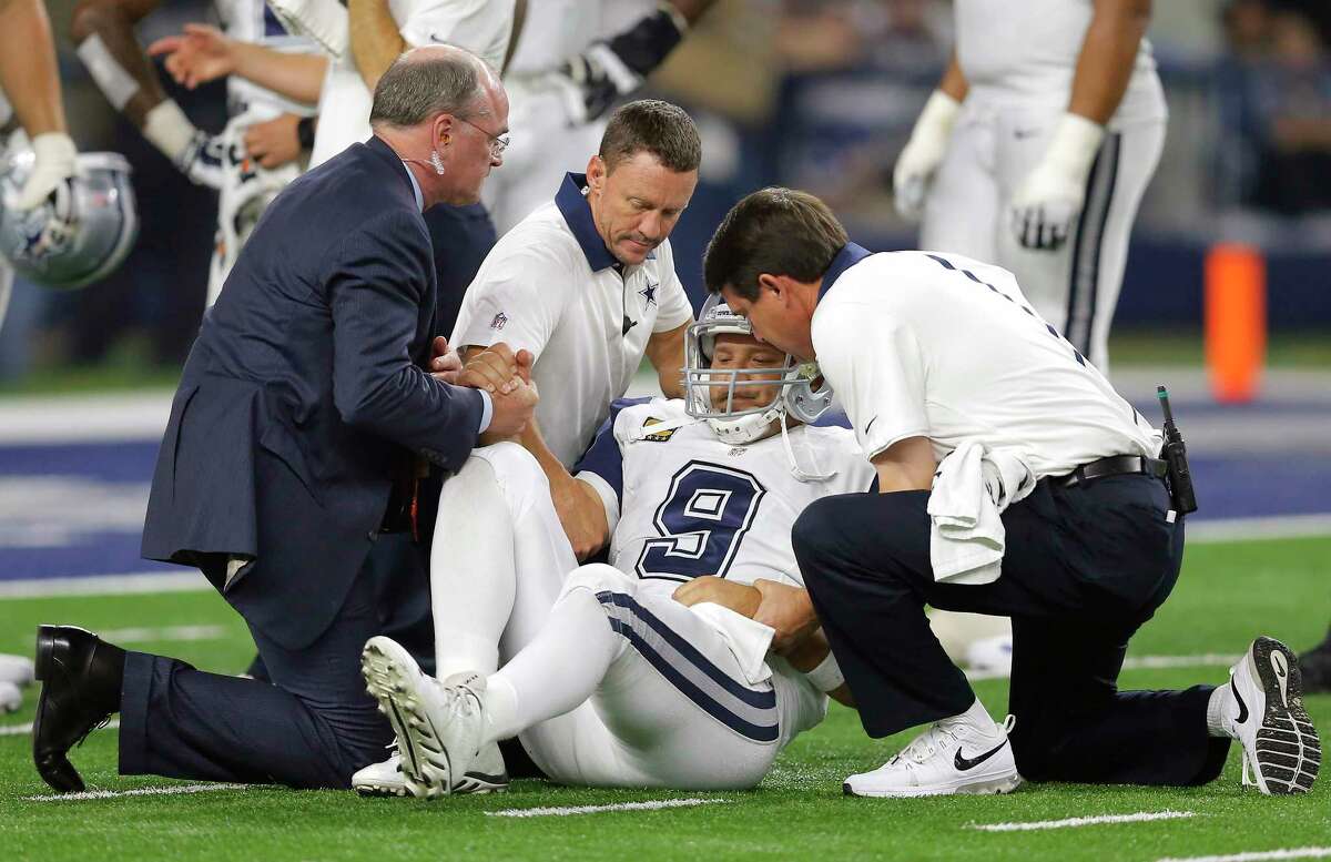 Dallas Cowboys quarterback Tony Romo is helped off the field after suffering a fractured collarbone on Thursday.