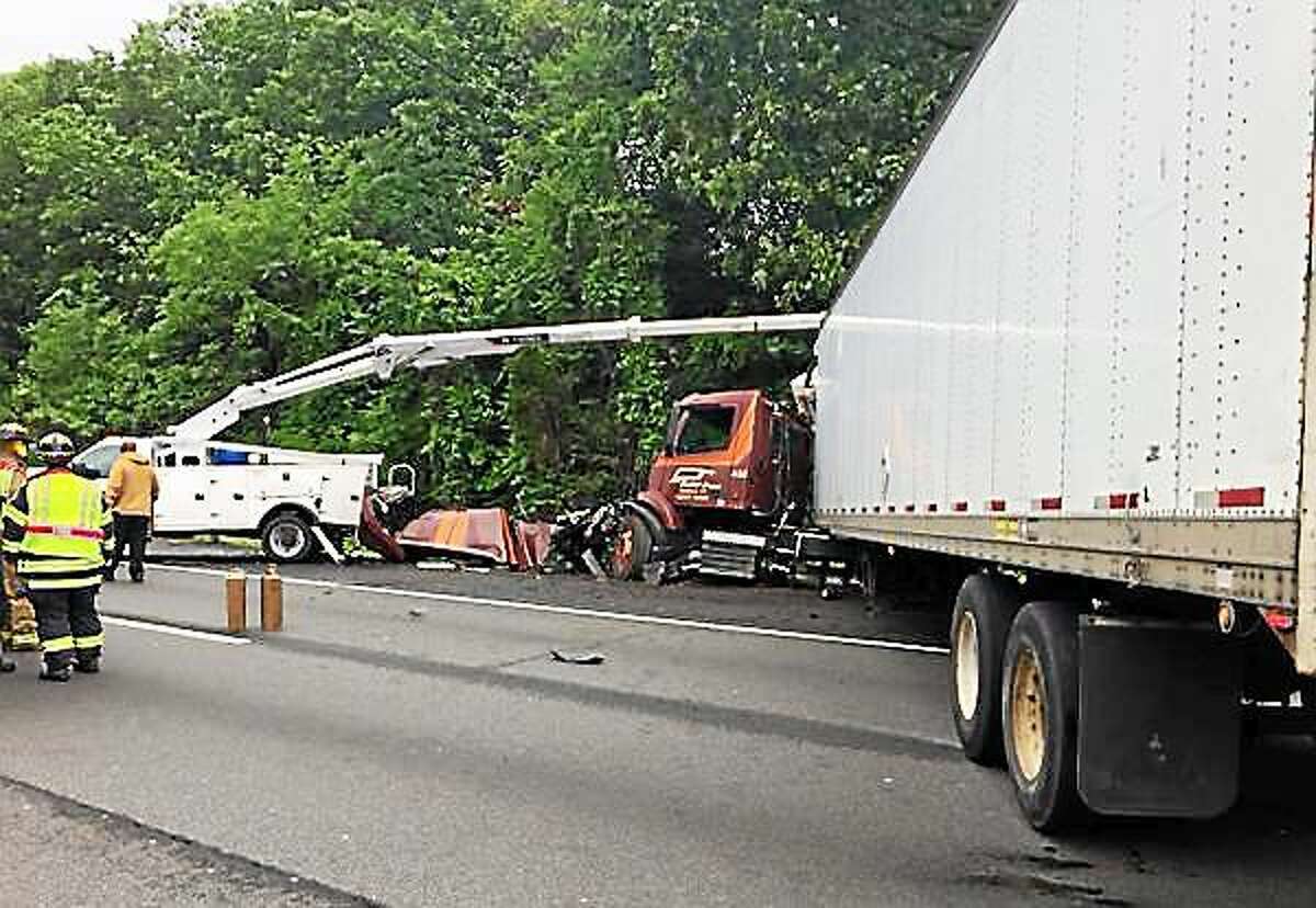 A contractor suffered serious injuries Tuesday when a tractor-trailer crashed into the back of a boom truck as he worked on a DOT traffic camera Tuesday on Interstate 91 near the Rocky Hill/Cromwell line.