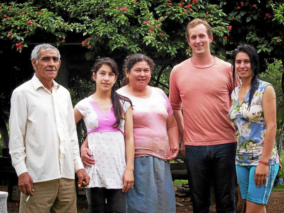 Submitted photo Wesleyan alumnus and returned Peace Corps volunteer Baker Woods with his host family.