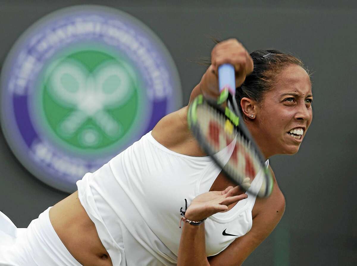 Madison Keys returns to Agnieszka Radwanska during their singles match at the All England Lawn Tennis Championships in Wimbledon, London, earlier this month.