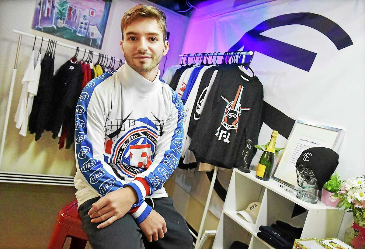 Dillon Milardo, 21, owner and designer of First Twelve Market at 386 Main Street in Middletown, a senior majoring in fine art at Central Connecticut State University and 2010 graduate of Middletown High School, describes his clothing: “From the sporting stage to the streets ... we are celebrating the divided cultures of the world as one, translated through pioneering street and sporting design.”