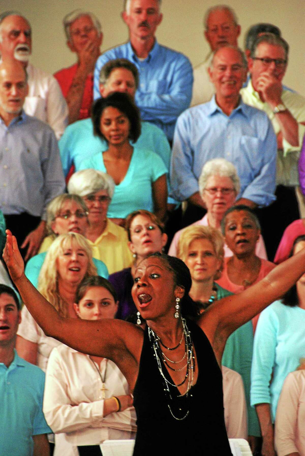 ìMusic at the Meetinghouseî is excited to announce the dates for another uplifting ìShoreline Soulî Community Choral Gospel Workshop at the First Congregational Church (on the town green) directed by the shorelineís own, Angela Clemmons. All levels are welcome to participate. The five 2-hour workshop sessions will culminate in a hand-clapping, foot-stomping, this-couldnít-possibly-be-Madison, CT concert, where the participants will perform the traditional and contemporary gospel songs theyíve learned. ìOur weekly sessions are upbeat, fun and very user-friendly,î Angela says. ìNo one needs to know how to read music. All songs are taught by ear and everyone is given a practice CD. Because itís all about the music and not a church service, we get singers from all faiths and even the faith-less. It works well. Itís amazing how much the choir learns and how confident they become in five short weeks, particularly when many have never sung gospel before.î There will be five Monday sessions, April 27, May 4, 11, 18, (skip Memorial Day), resume June 1, from 6:45-8:45 PM, at the First Congregational Church (on the town green), 26 Meetinghouse Lane, Madison, CT. The concert, which is free and open to the public will be Sunday, June 7 at 3:00 PM, with a pre-concert rehearsal at 1:30 PM. The workshop registration fee is $90.00. If PAID by April 13, the early registration fee is $80.00. You may begin your registration by phone: 203-619-1415 or e-mail: shorelinesoul@comcast.net. Registration is only complete after payment has been received. Some scholarships are available. Although the workshop is primarily for adults, youth who are able to follow a lyric sheet are welcome to participate.