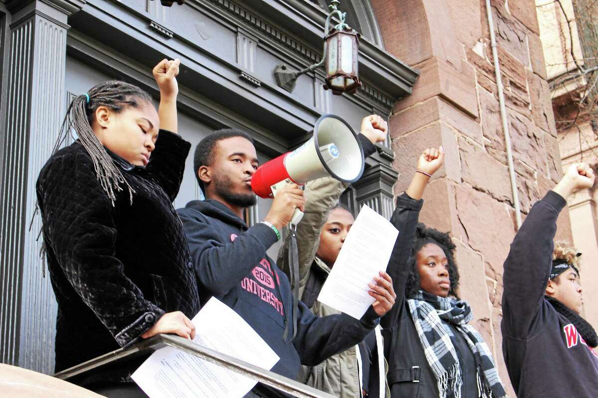 Wesleyan University students gathered in force Wednesday to protest what they call racial inequalities on campus, standing in solidarity with demonstrators at colleges across the country over the past two weeks. The protests were ignited after a similar rally at the University of Missouri.