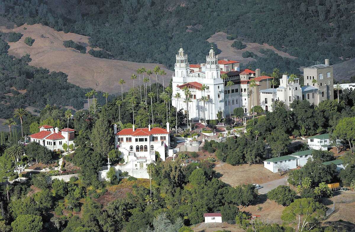 FILE - This Oct. 23, 2006, file photo, shows "La Cuesta Encantada," The Enchanted Hill, the legendary home now best known as Hearst Castle, built by publishing tycoon William Randolph Hearst in San Simeon, Calif. The acclaimed film "Citizen Kane" will be shown at Hearst Castle. The 1941 film, in part based on Hearst's life, so infuriated Hearst that he sought to derail the movie, which portrayed the rise and fall of an obsessively controlling character. (AP Photo/The Tribune, Joe Johnston, File)
