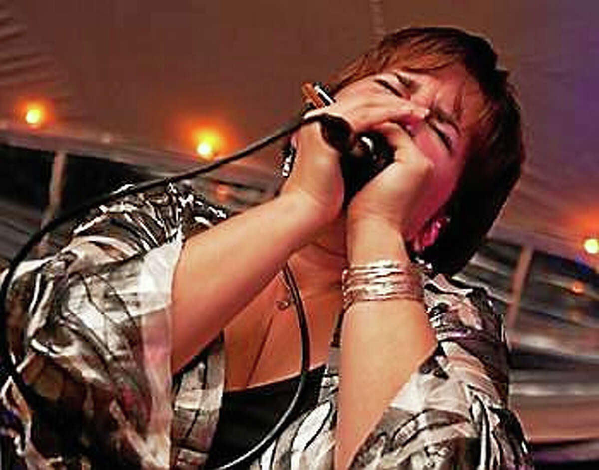 Photo by Jenn DeanDiane Blue from Boston performs in the Harmonica Showcase at Black-Eyed Sally’s on Saturday.