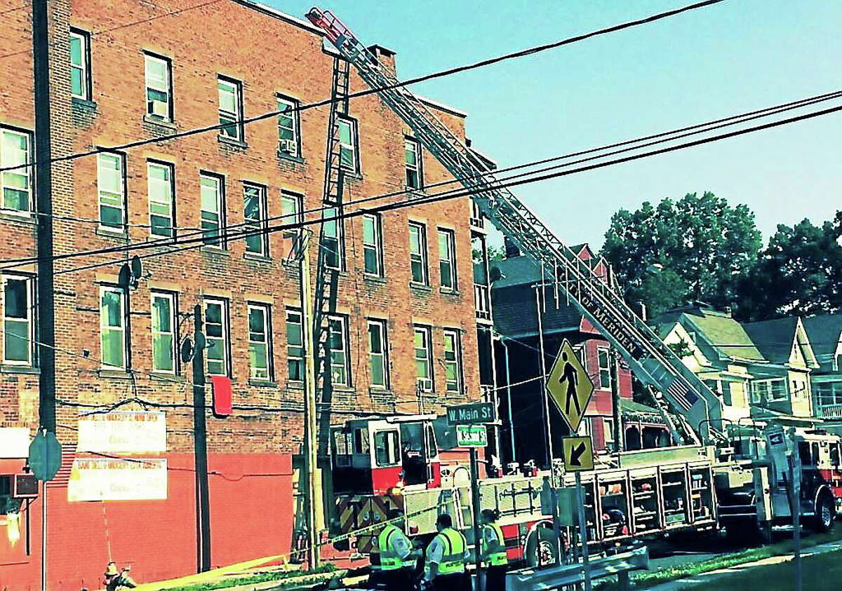 A fire damaged a building at 250 W. Main St. in Meriden. Crews from multiple towns assisted with the firefighting effort.