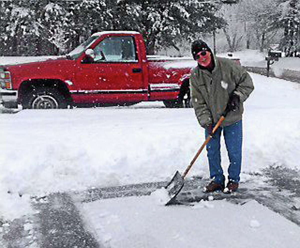 Submitted photo Australian Bob Crawshaw shovels snow in Middletown on Monday.