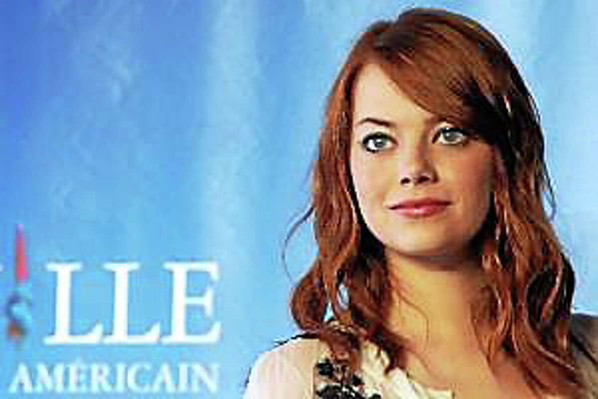 Emma Stone poses during the photocall of the movie “The Help” at the 37th American Film Festival, in Deauville, northwestern France, on Sept. 3, 2011.