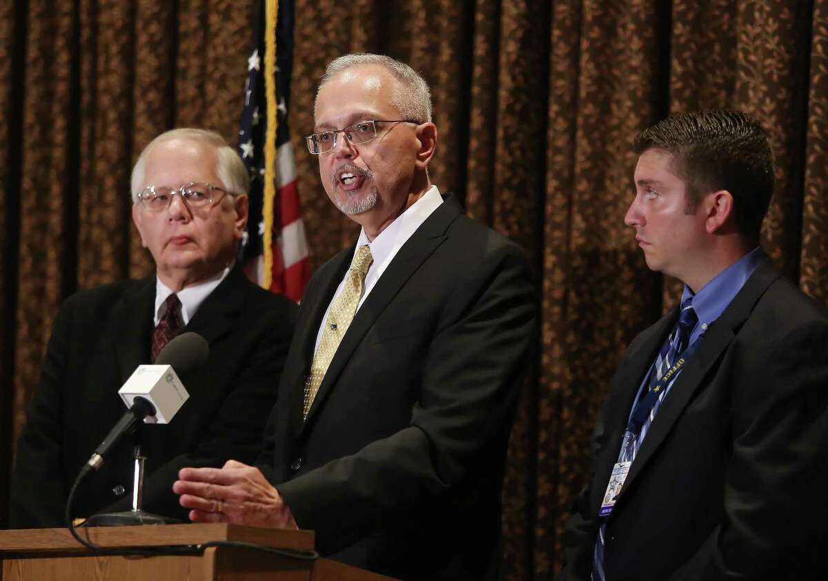 Lake County Coroner Dr. Thomas Rudd, left, Lake County Major Crime Task Force Cmdr. George Filenko, center, and Lake County sheriff’s Detective Chris Covelli confirm that Fox Lake Lt. Charles Joseph Gliniewicz, 52, died Sept. 1 of a self-inflicted gunshot wound, during a press conference Wednesday, Nov. 4, 2015, in Round Lake Beach, Ill. Gliniewicz carefully staged his death to make it look like he was killed in the line of duty. He had been stealing for years from a youth program he oversaw, authorities said Wednesday.