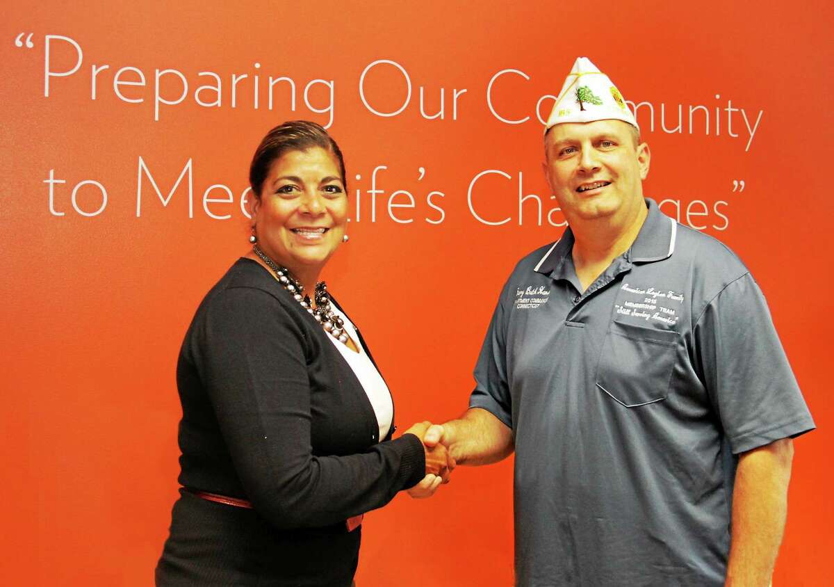 Community Renewal Team’s president and CEO, Lena Rodriguez, is joined by Harry “Butch” Hansen, commander of the American Legion Department of Connecticut, who recently announced an affordable assisted living residence for Veterans as his “Commander’s Project” for the 2014-15 program year.