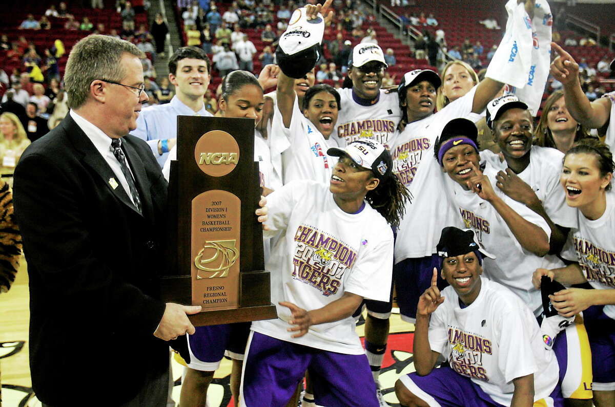 Bob Starkey, who was the LSU interim coach at the time, celebrates with his team after they beat UConn in the 2007 Fresno Regional final in the NCAA tournament.