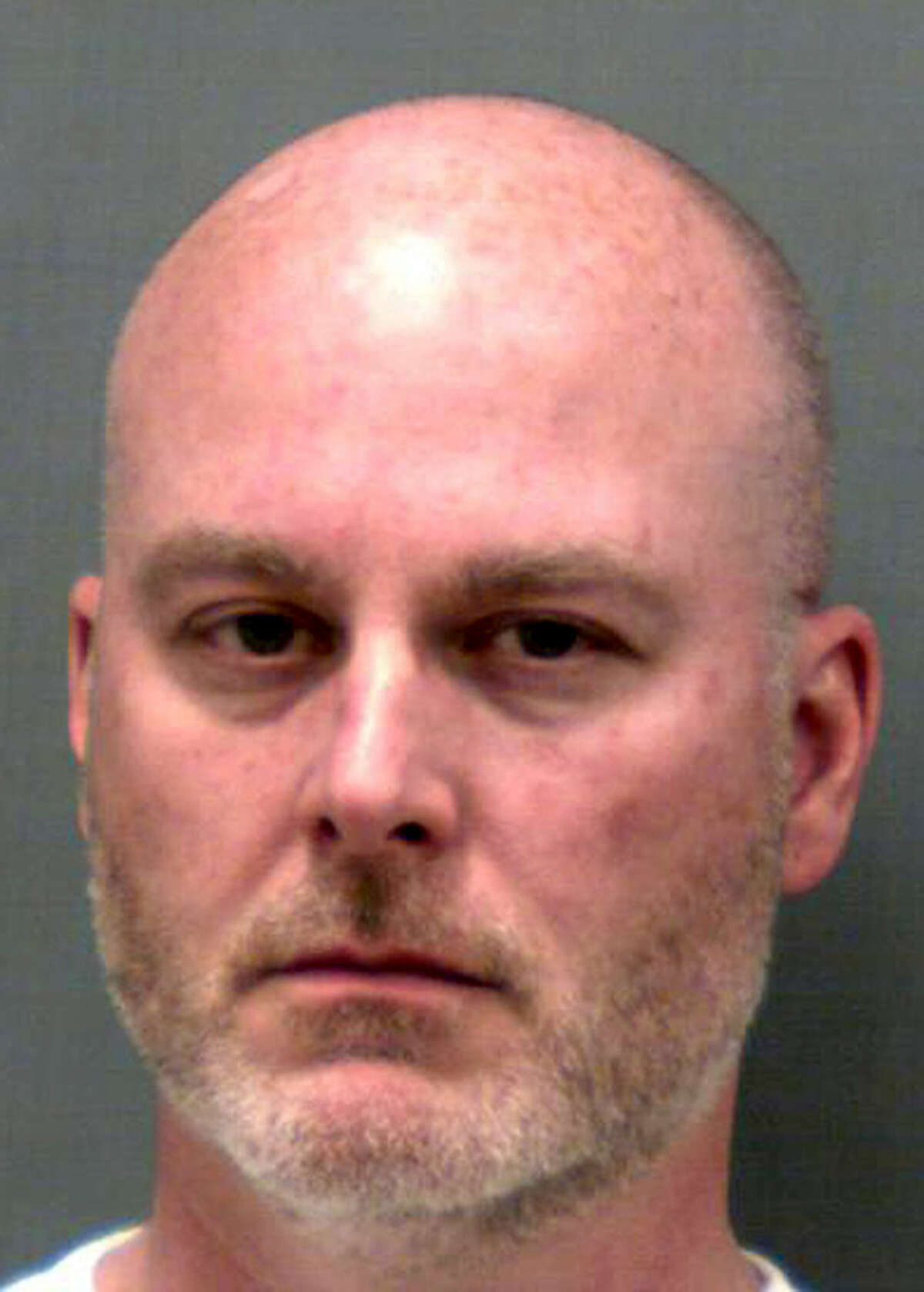 William Ruscoe is shown in this photo provided by the Connecticut Department of Correction. Ruscoe, of the Trumbull police in Connecticut, began a 30-month prison term in January 2015 after pleading guilty to second-degree sexual assault of a 17-year-old girl he met through a program for young people interested in law enforcement.