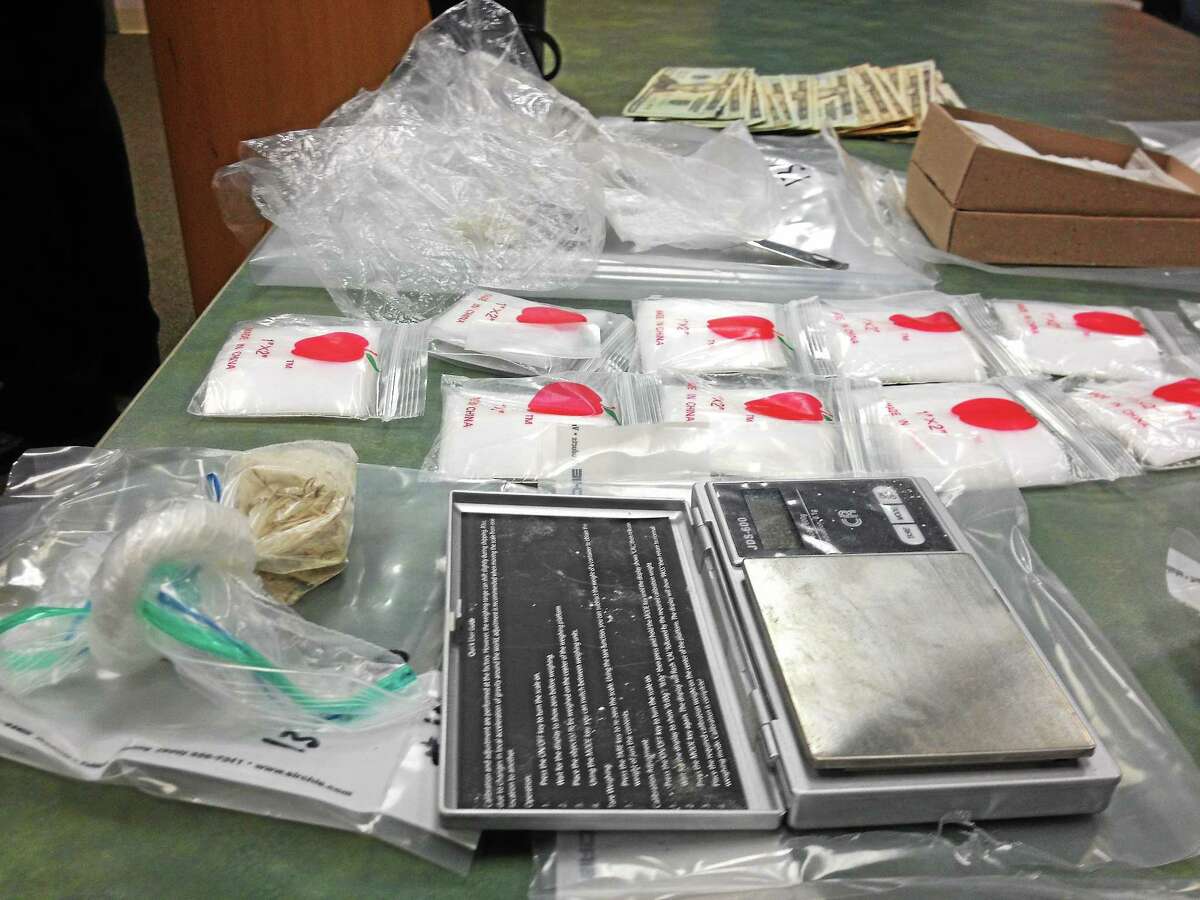 Area law enforcement officers have been clamping down drug dealers. This archive photograph taken by Cromwell police shows a seizure of heroin, cash and drug paraphernalia.