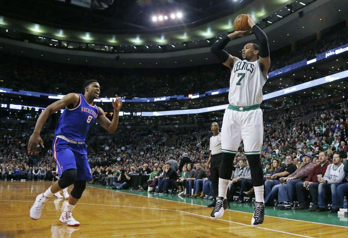 Celtics forward Jared Sullinger shoots a jumper before Sacramento Kings forward Rudy Gay can defend him in the first half of Wednesday’s game in Boston.