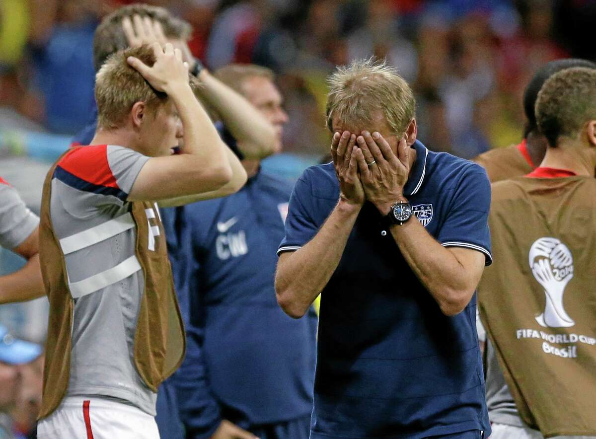 United States head coach Jurgen Klinsmann reacts during the World Cup match against Belgium Tuesday at the Arena Fonte Nova in Salvador, Brazil.