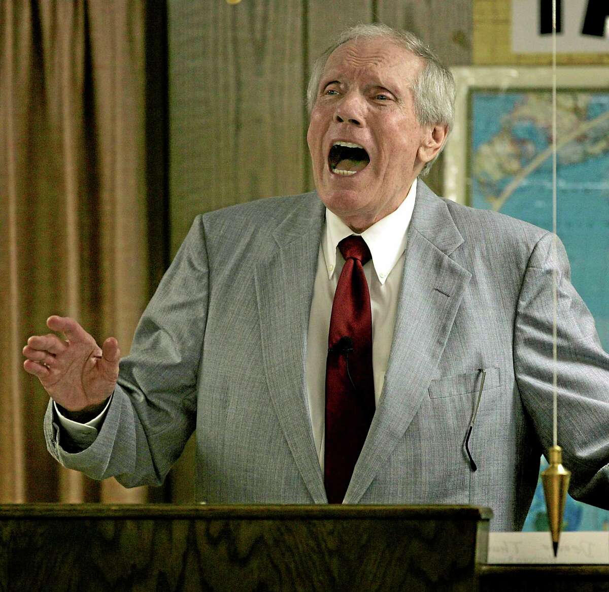 In this March 19, 2006, file photo, Rev. Fred Phelps Sr. preaches at his Westboro Baptist Church in Topeka, Kansas. Phelps, who founded a Kansas church that ís widely known for its anti-gar protests at military funerals, has died.