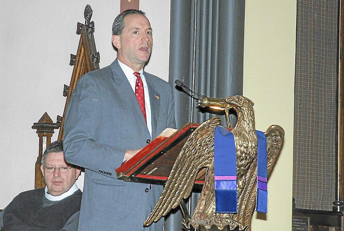 State Sen. Paul Doyle speaks to a crowd of 150 people at the Church of the Holy Trinity in Middletown in this 2012 photograph. The annual event commemorates National Homeless Person’s Memorial Day.