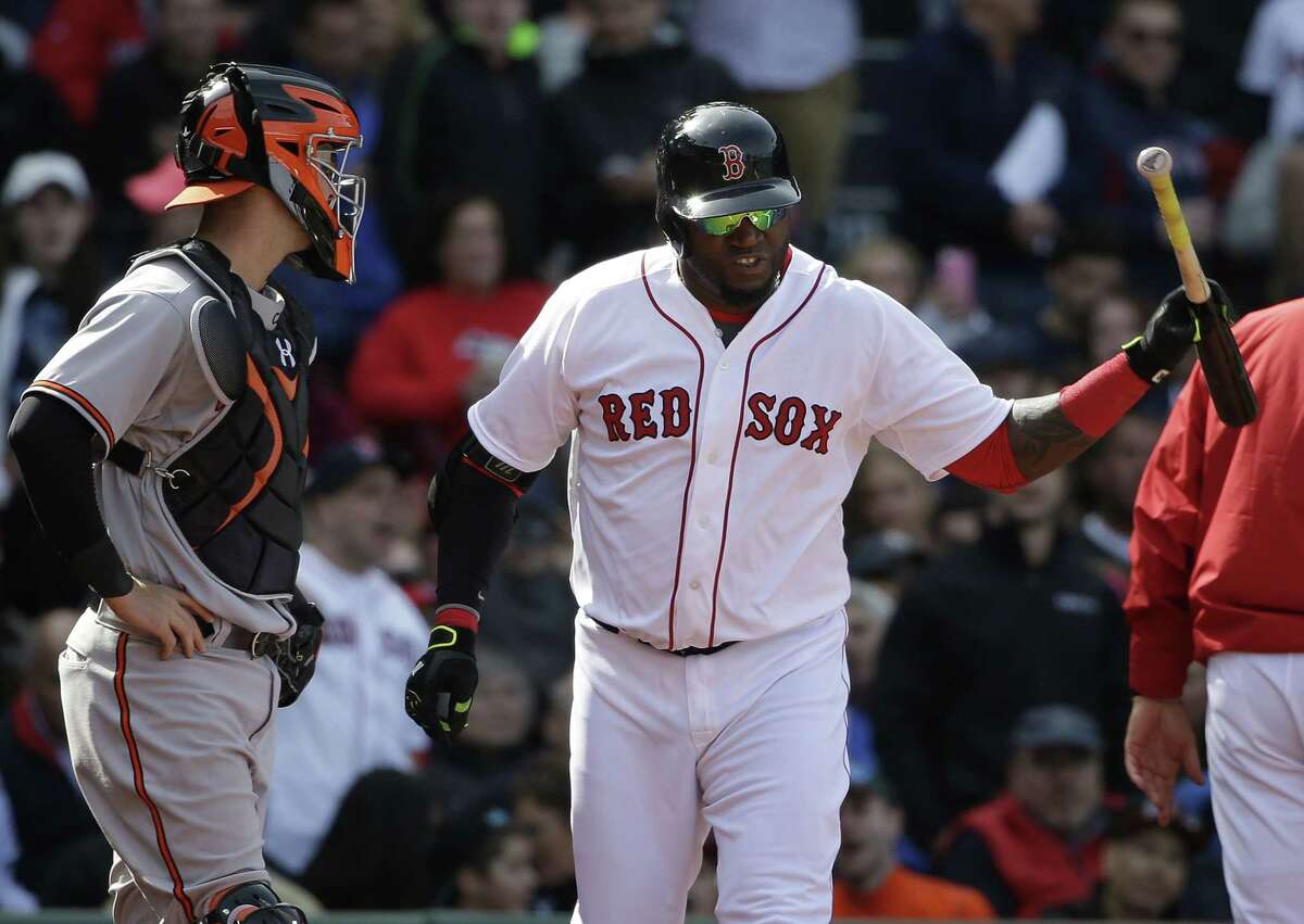 Red Sox DH David Ortiz throws his bat after being ejected from Sunday’s game against the Baltimore Orioles in Boston.
