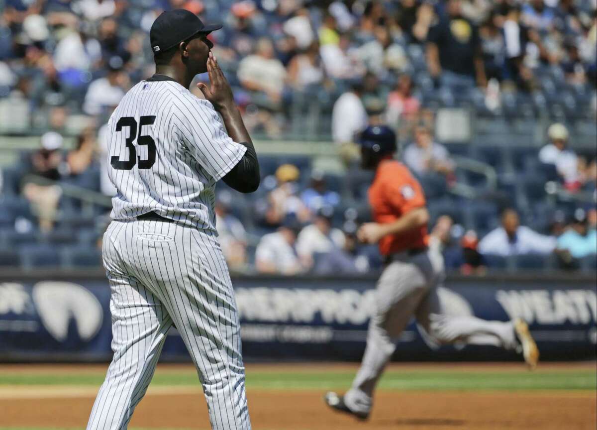 Yankees starter Michael Pineda reacts as the Houston Astros’ Evan Gattis runs the bases after hitting a home run during the second inning of Wednesday’s game in New York.